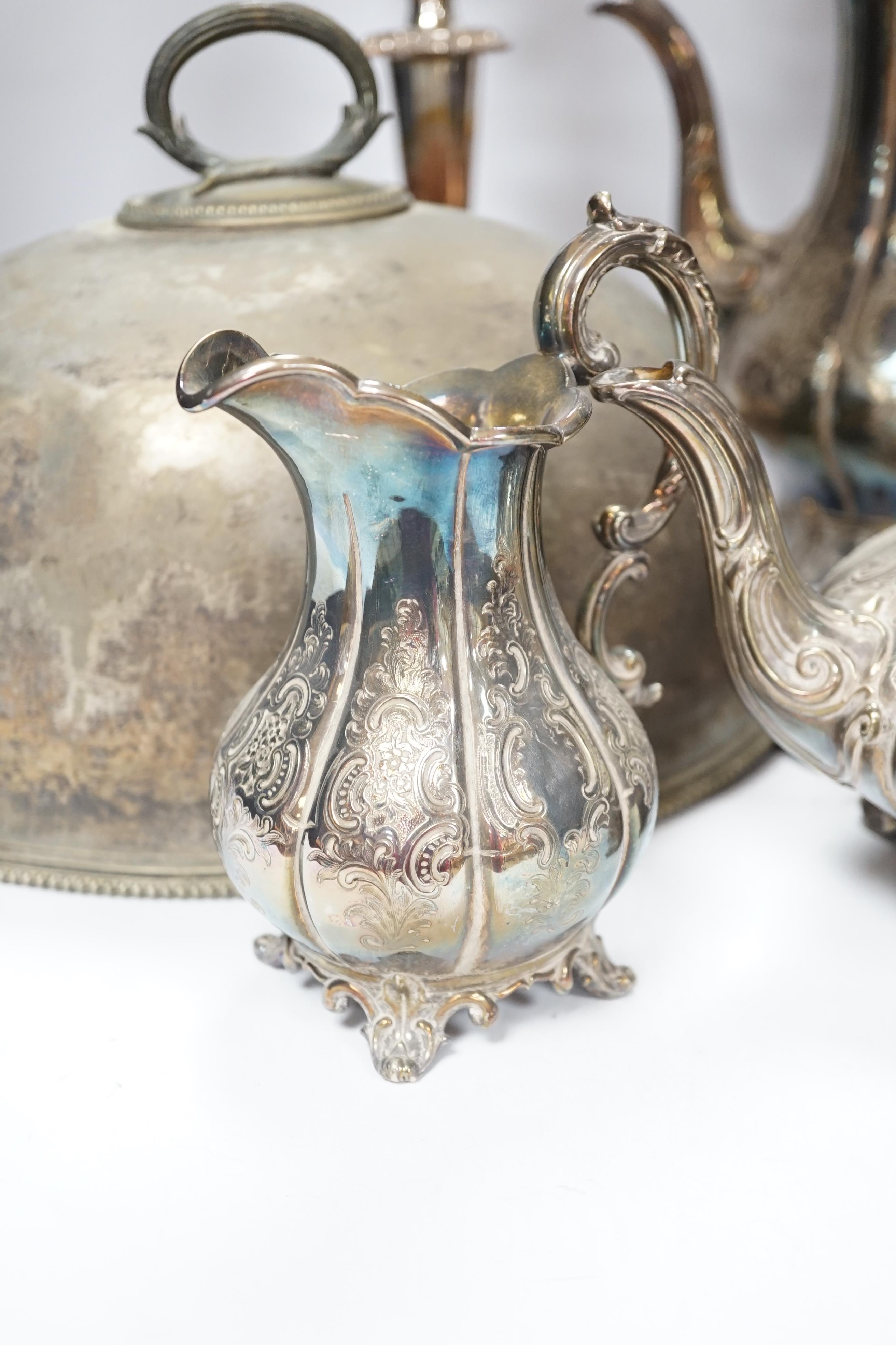 A quantity of silver plated wares to include a three piece tea set, tureen cover and pair of candelabra, 42cm CITES Submission reference S7EVMP55